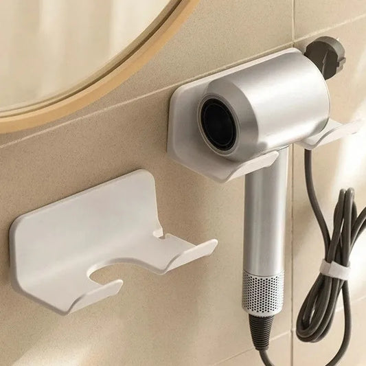 Wall mounted hair dryer holder